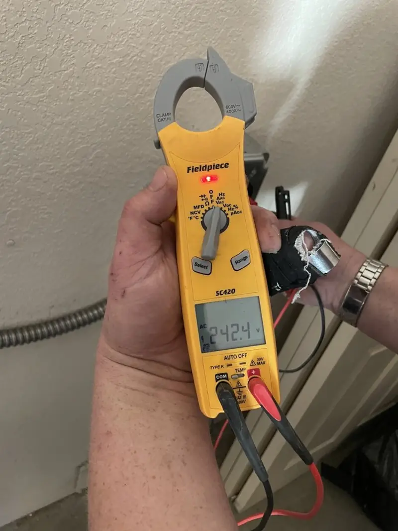 Voltage testing with clamp meter during Hot Tub / Pool Electrical Wiring in East Alton